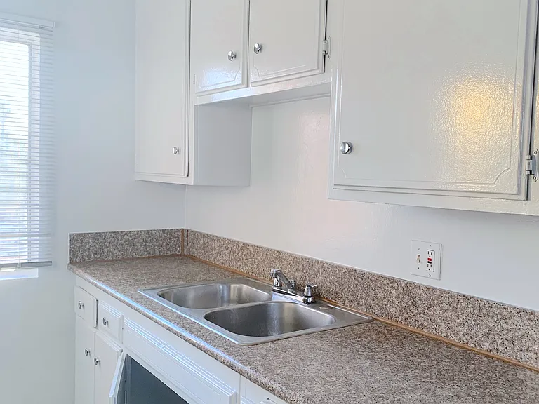 Plenty of additional cabinets and granite counter spaces