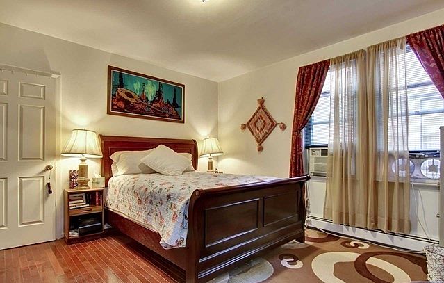 Bedroom with walk in closet
