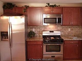 Large kitchen with granite counter tops