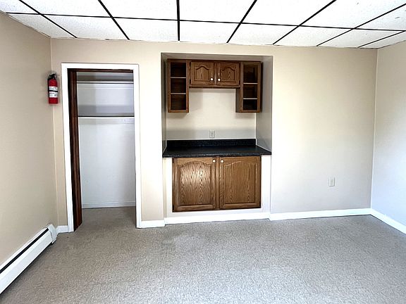 Pantry with more counter space and storage on the other side of the 13x13 area kitchen.