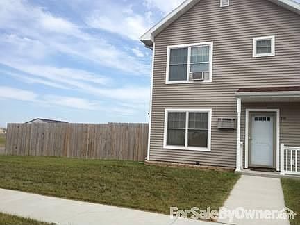 Front of House
						:
						Vinyl siding, new storm door.
