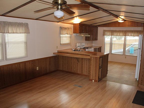 Living Room has Vaulted Ceiling