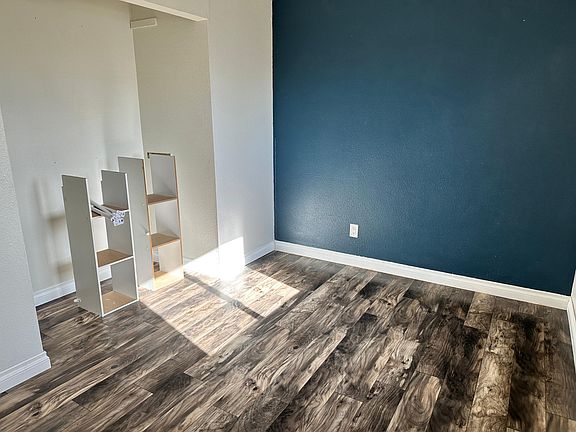 upstairs bedroom #3 (closet will be reassembled prior to move in- just updated the floors)