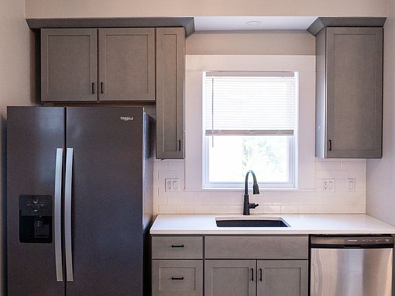Kitchen, refrigerator/freezer with water and icemaker in the door and dishwasher