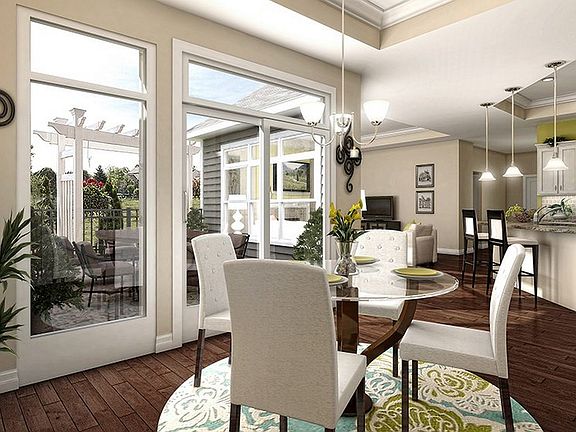 Interior virtual rendering of a Portico dining room, kitchen, and living room with view of the court