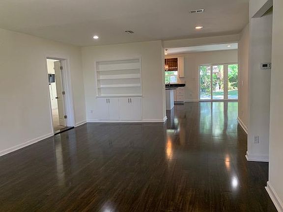 Open floorpan with wood floors