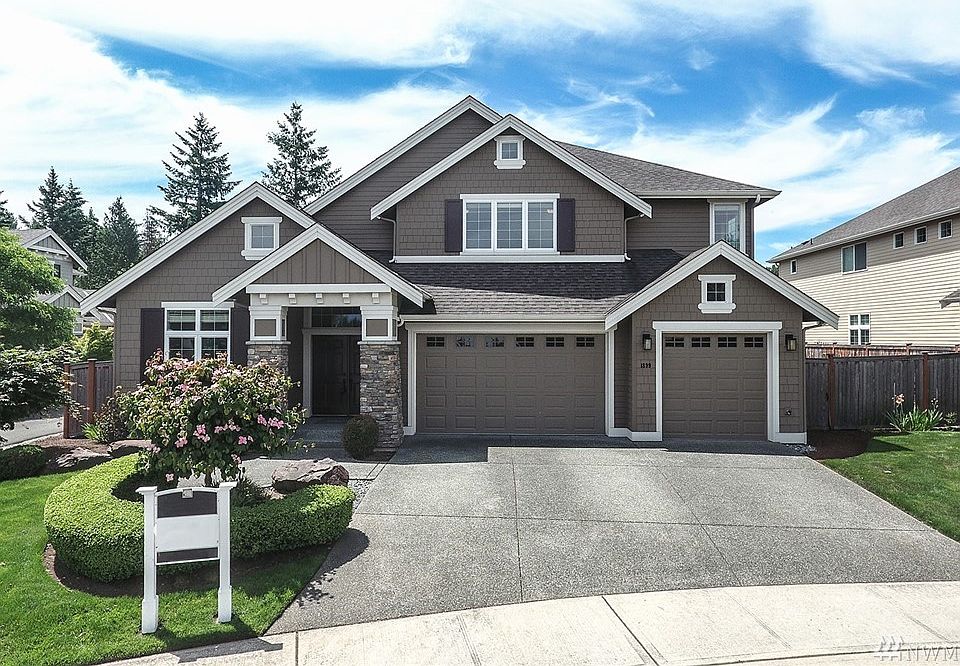 Corner lot and one of the largest lots in Glencoe at Trossachs with 3 car wide garage!