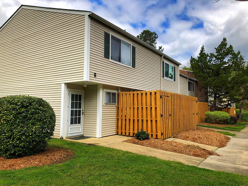 Village Green Condo - B1 is a quiet, end unit with two dedicated parking spaces.