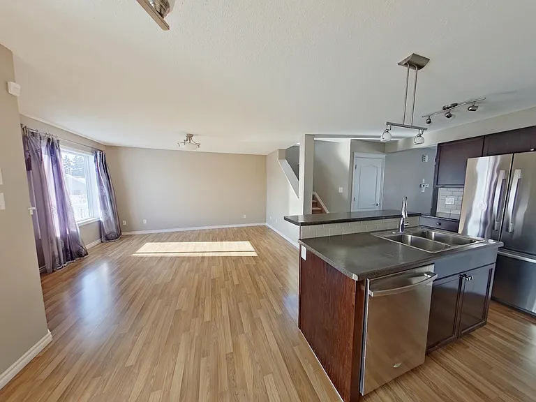 7665 Schmid Cres NW — Photo 4
