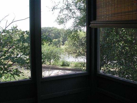 View from screened porch, LR, kitchen