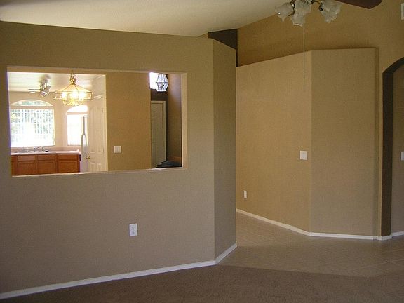 looking toward kitchen & entry, from living room