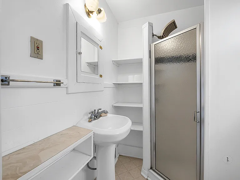Stall shower in bath
