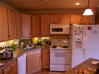 Kitchen and fridge with ice and water dispenser