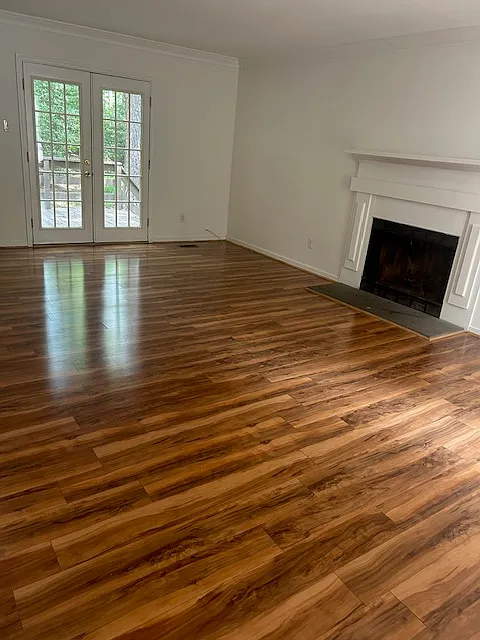 Living space with wood burning fireplace - 5813 Mill Spring Ln