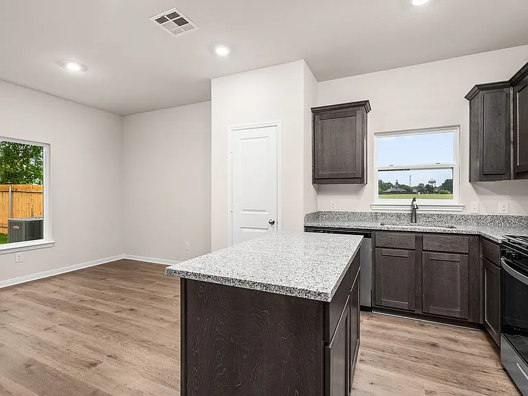 The dining room sits right off of the kitchen.