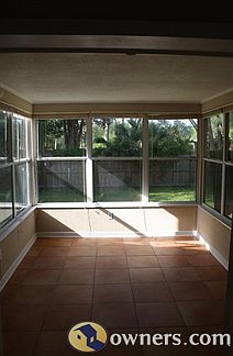 Enclosed Florida room with Spanish tile