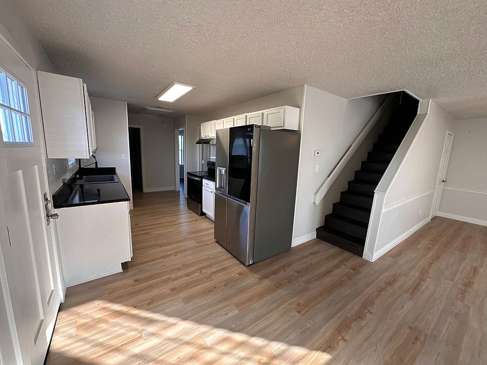 Entryway and kitchen.