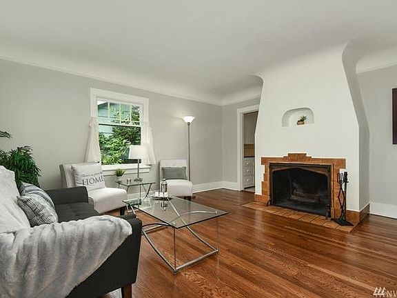 Living Room with Hardwood Floor and Fireplace