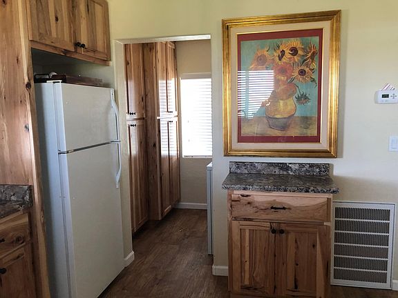 Kitchen leads into the pantry and laundry room.