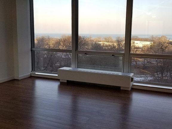 Living room looking east into Lincoln Park and Lake Michigan