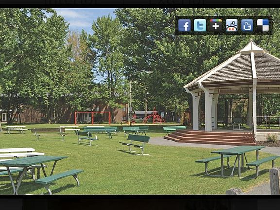 Apartment complex Backs up to Lonergan Park.