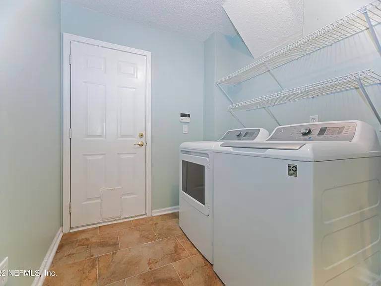 4944 Greenland Hideaway Dr N — Photo 21