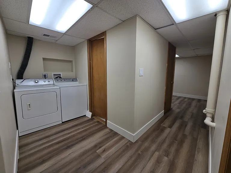Hallway to Bedroom and Laundry Room