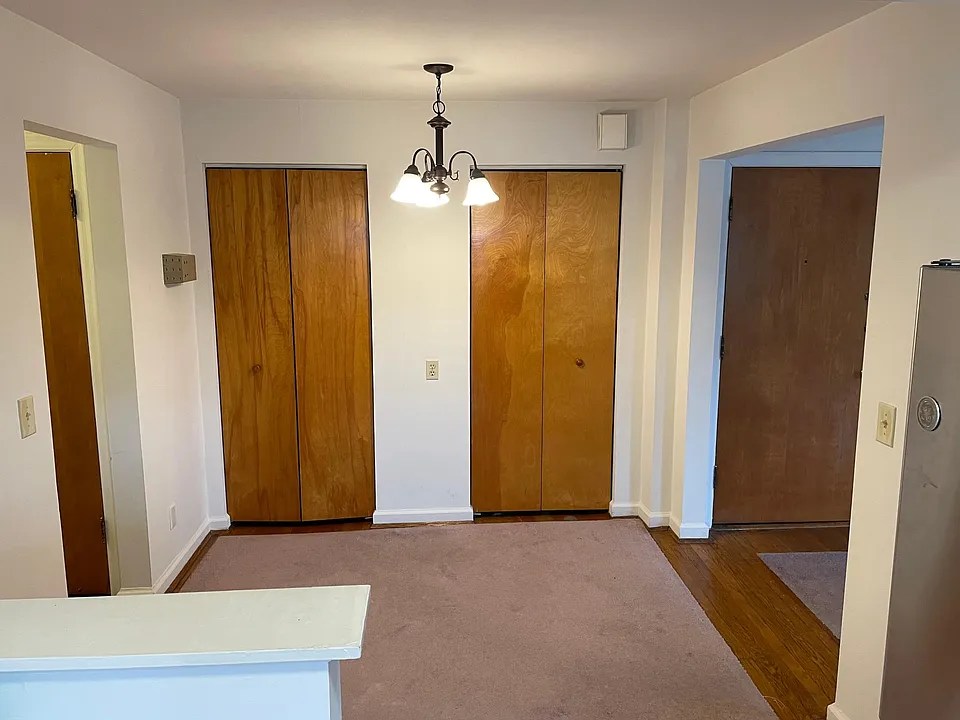 dining room with two closets