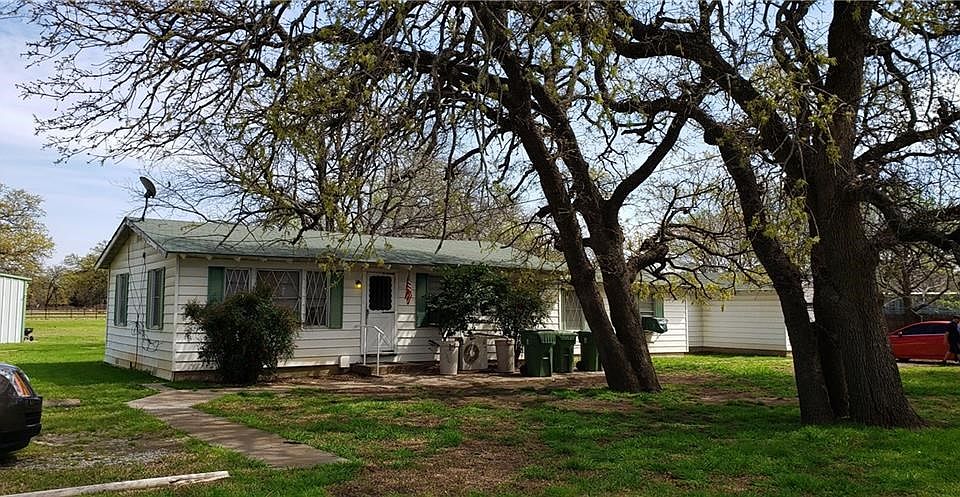 Southlake Carroll ISD. one acre of land, with a 30x40 steel building with a concrete floor.