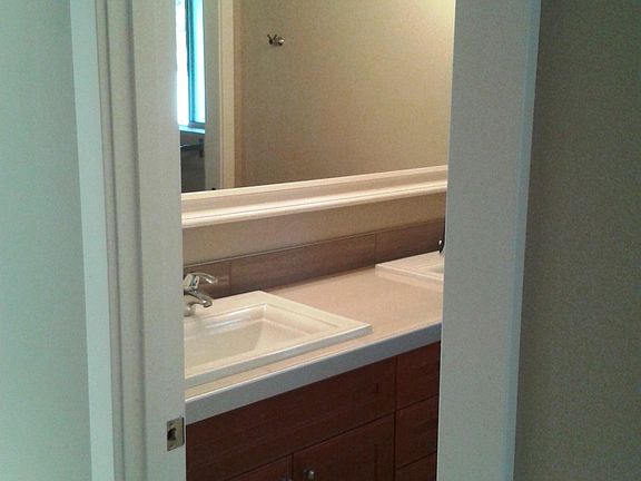 Double custom Fir Vanity with Kohler Sinks.