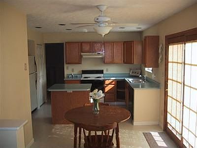 Eat-in Kitchen with Franch Doors leading to backyard