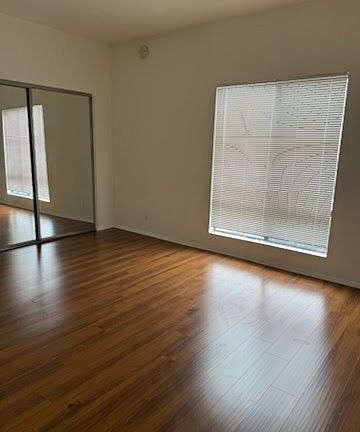 Bright bedroom with updated floors