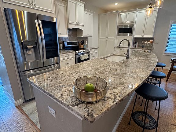 5th image of 6207 S Elberon St