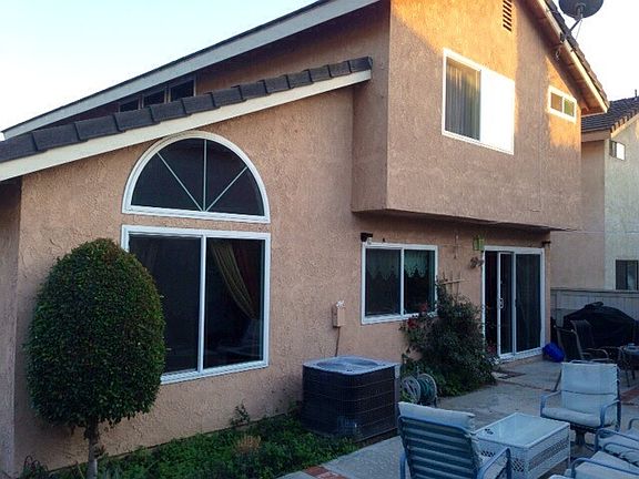 Spacious backyard with fruit trees and space for herbal/vegg