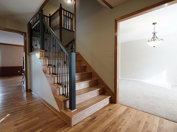 new hardwood and wrought iron