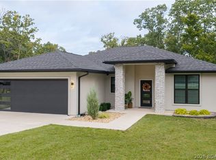 516 Grand Point Blvd, Sunrise Beach, MO 65079