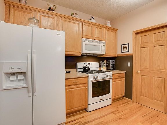 Cabinets have pull outs installed.  Notice the solid wood 6 panel doors throughout.