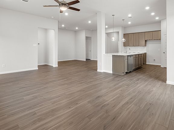 Family Room to Kitchen and Dining Area