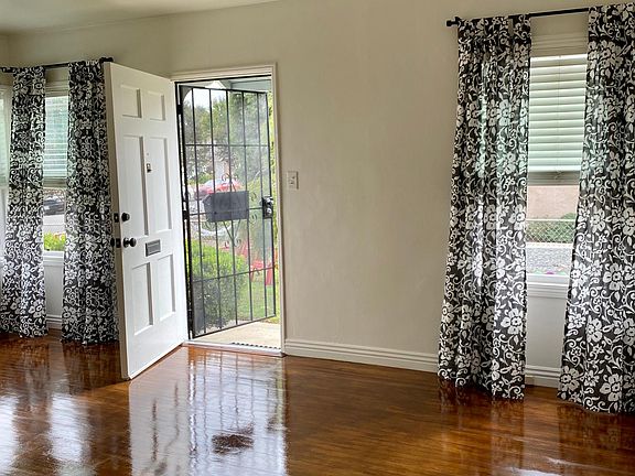 Hardwood floors throughout, Security doors let in air and still provide privacy.