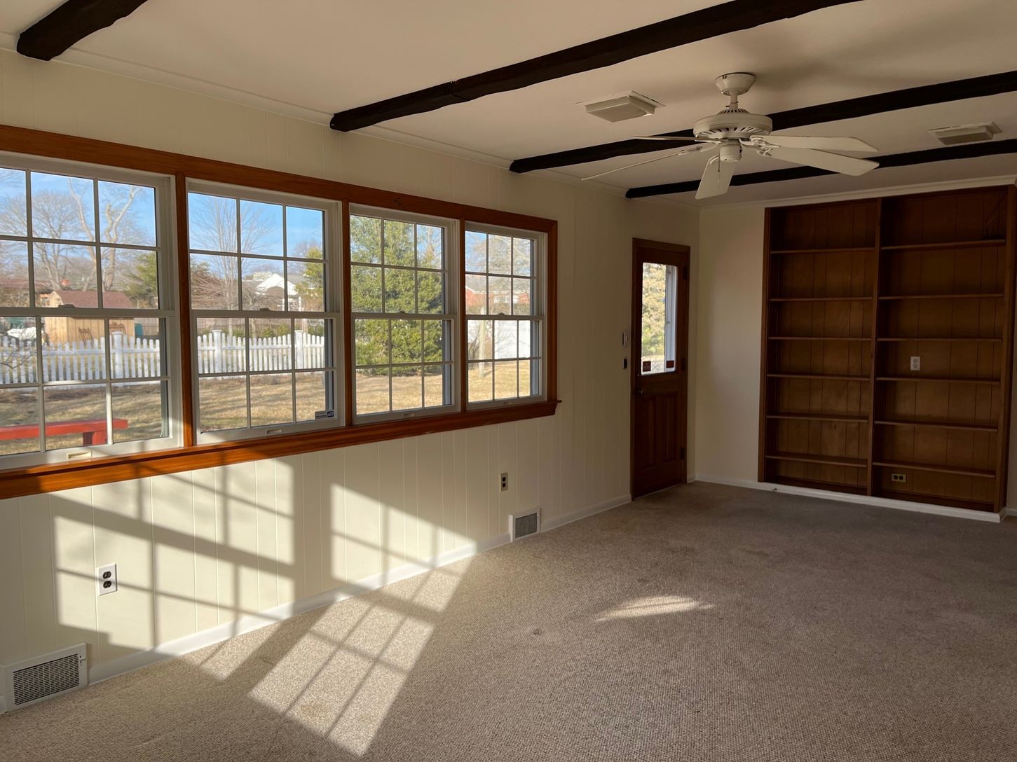  Den with Built In Cabinets and Access to Deck