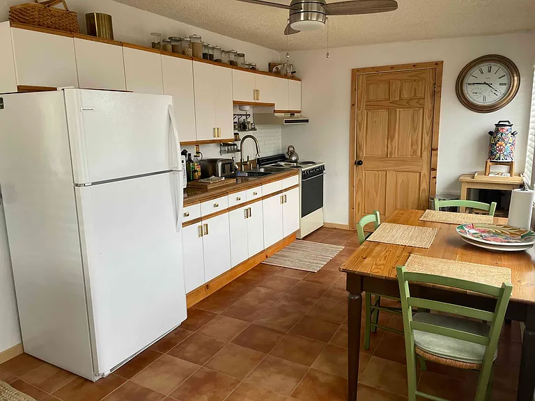 Large kitchen with lots of cabinet space.
