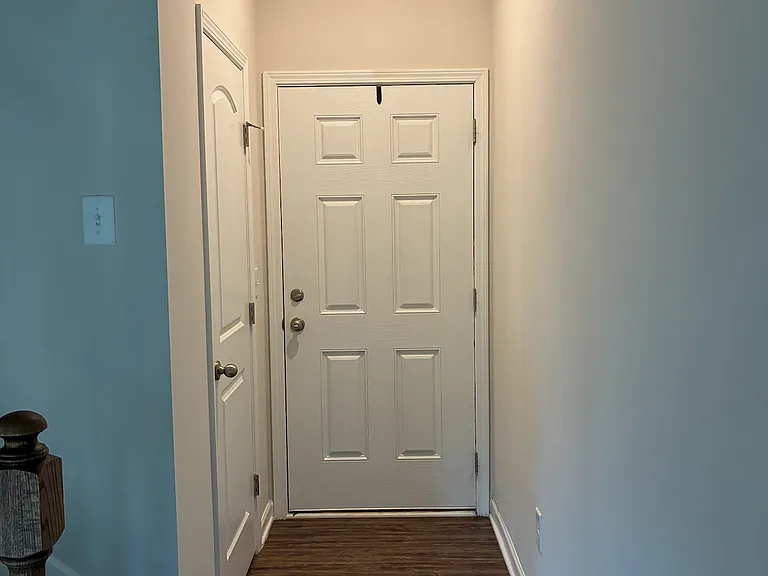 Entrance to the home with coat closet