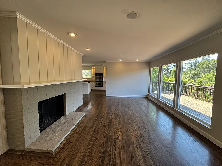Living room looks out to a large deck