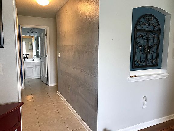Hallway to 2nd bed and bathr