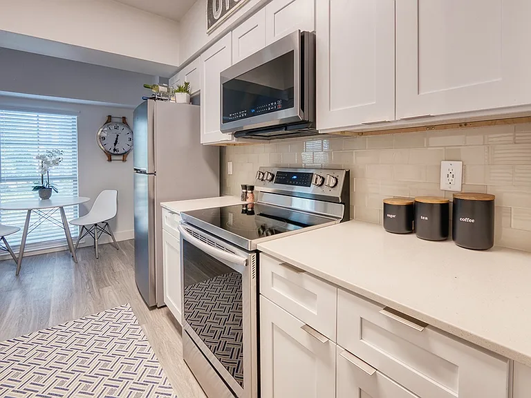 Model apartment kitchen and dining area