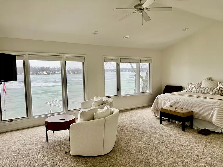 Huge master bedroom complete with king bed and sitting area
