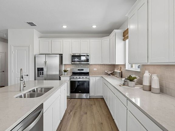 Abundant cabinet space available in kitchen