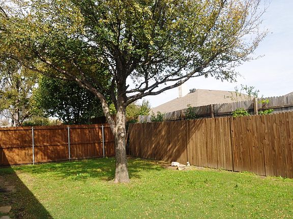 Private fenced spacious backyard