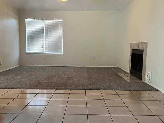 Living room with gas or wood fireplace