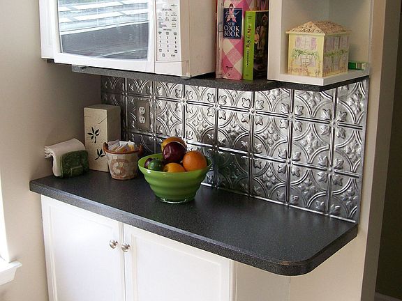 THE KITCHEN HAS EXTRA CABINETS FOR MORE STORAGE!